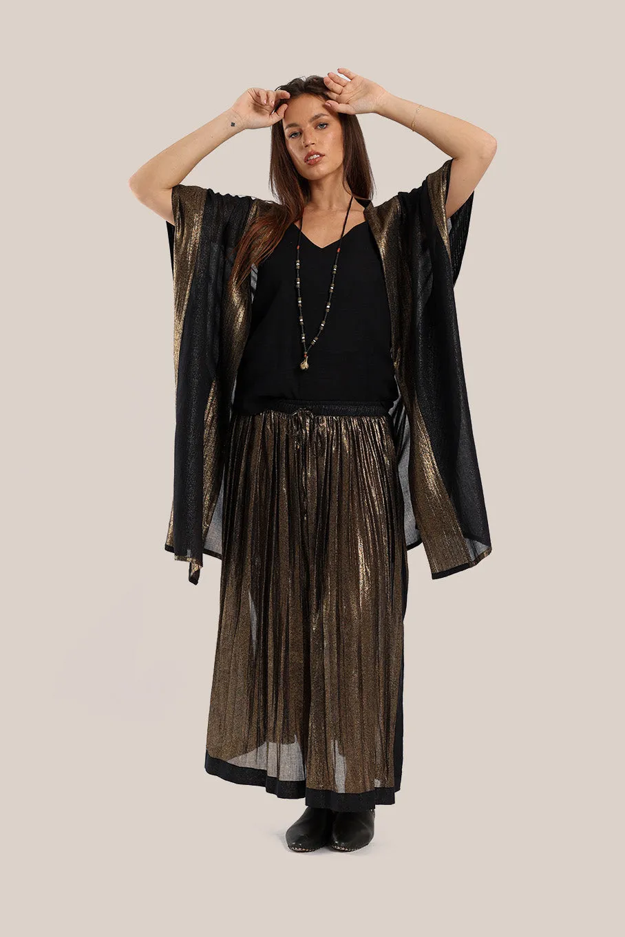 Abaya style coat with short and tiny pleats